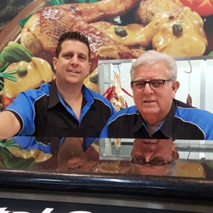 Tony and Joe Scarfo behind the counter